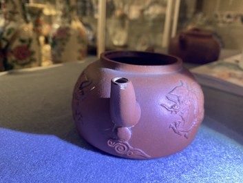 Two Chinese Yixing stoneware teapots and a famille rose 'Shou Lao' group, Kangxi and 20th C.